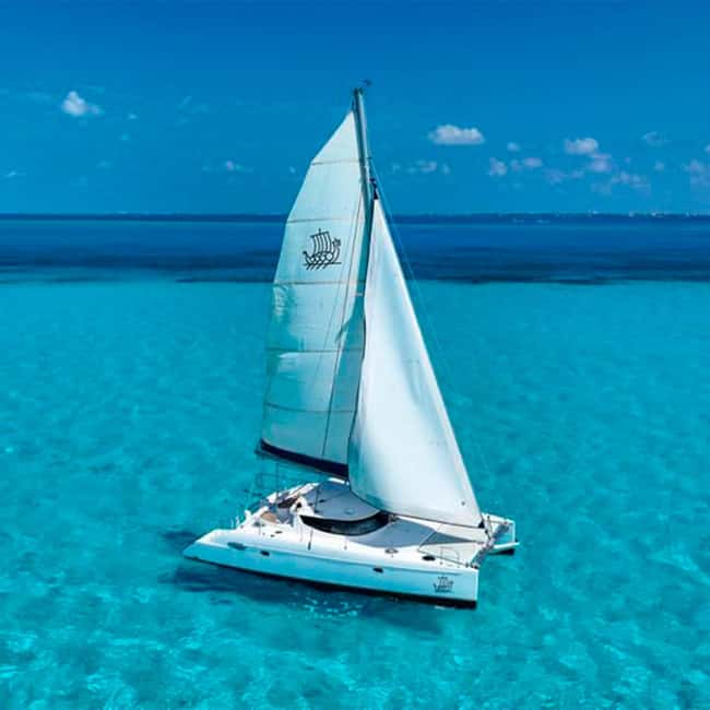 Cancun: Premium Catamaran with Transportation & Dock fee - Sailing out from Cancun