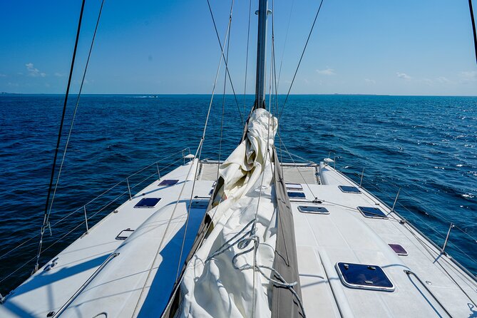 Cancun Private Catamaran Cruise– Open Bar & Snorkeling Experience - Booking, Weather, and Cancellation Details