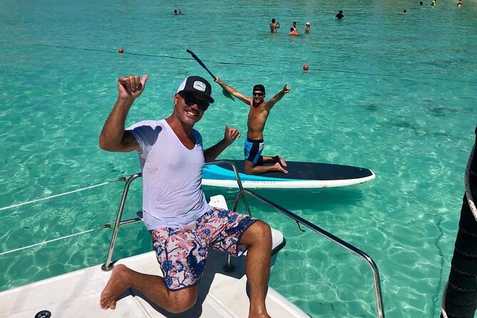 Cancun to Isla Mujeres Private Catamaran Cruising Snorkeling Fun! - Sailing south with drinks and music