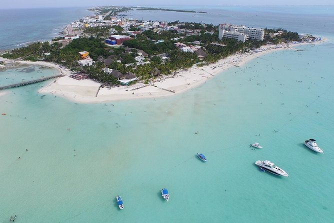 Catamaran adventure to Isla Mujeres with Snorkel,Buffet,Open Bar and Beach Club - Setting sail from Marina Albatros