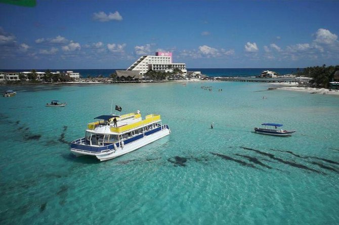 Catamaran Adventure Tour Isla Mujeres Unlimited from Cancun with Transportation - Isla Mujeres free time, murals, shops, and lunch