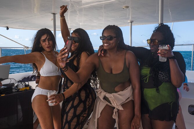 Catamaran Booze Party With Open Bar in Cancun - What the crew can and cannot solve