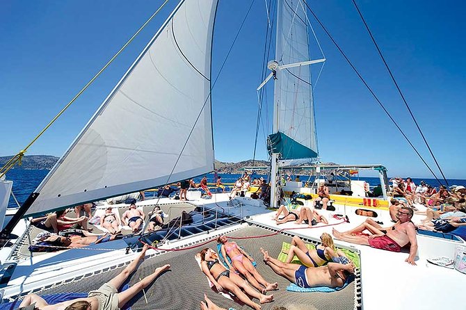Catamaran Cruise from Port d'Alcudia with Lunch and Swim Stop - Passing Aucanada lighthouse and the northern cliffs