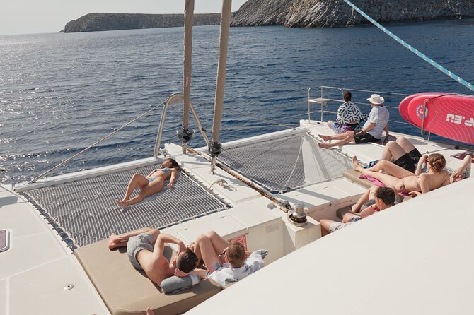 Catamaran Cruise to Dia Island with Meal and Water Activities - Swimming, SUP, snorkeling, and fishing