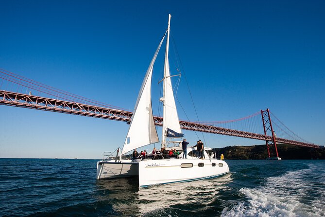 Catamaran Cultural Tour through Lisbon - Snacks, drinks, and the onboard mood