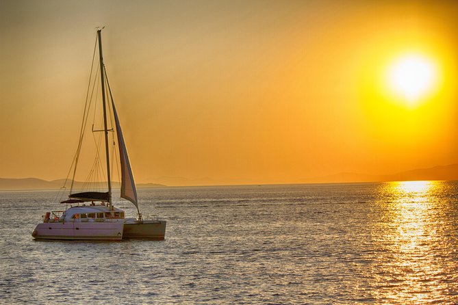 Catamaran Day & Sunset Cruises with meals Drinks and transportation - Rhenia’s clear water and the two-hour swim stop