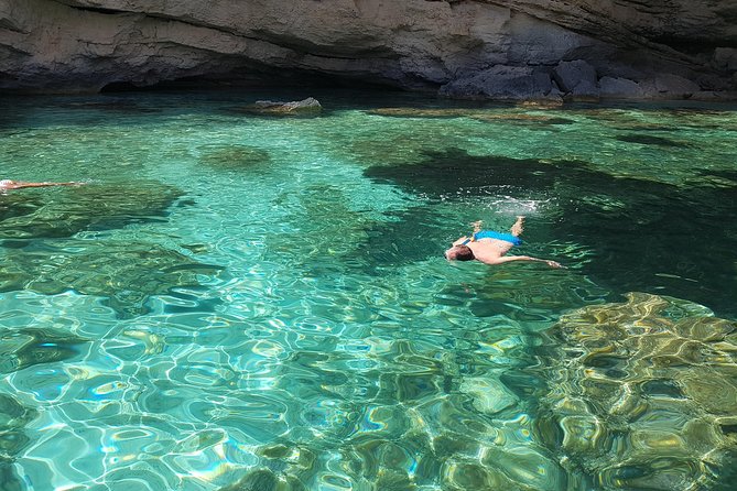 Catamaran Day Trip to the Cale di Orosei with Lunch - Snorkeling inside Grotta della Contessa