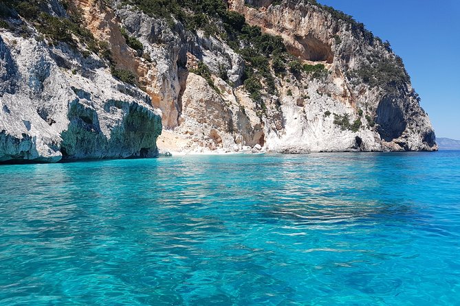 Catamaran Day Trip to the Cale di Orosei with Lunch - Passing beneath Pedra Longa
