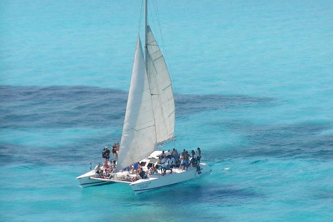 Catamaran Isla Mujeres Tour with Hotel Pick Up included - Group size, pace, and comfort