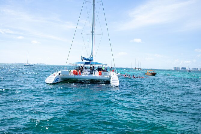 Catamaran Party on the Caribbean Sea to Isla Mujeres - Lunch and drinks at the beach club