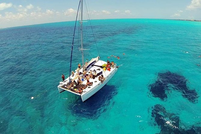 Catamaran Party on the Caribbean Sea to Isla Mujeres - Music, dancing, and the possible spinnaker flight