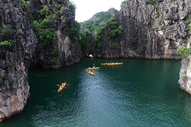 Catamaran Premium Cruise to Halong Bay & Lan Ha Bay in 1 Day Tour - Kayaking or bamboo boating at Bright and Dark Cave