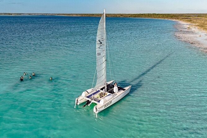 Catamaran Sailboat Bacalar Excursions - Swimming, fruit, and time to slow down