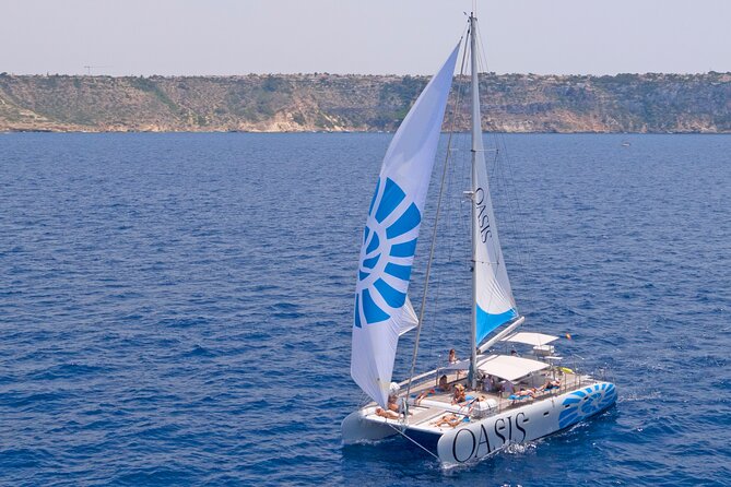 Catamaran sailing at sunset with tapas Palma de Mallorca - Who will enjoy this sailing most?