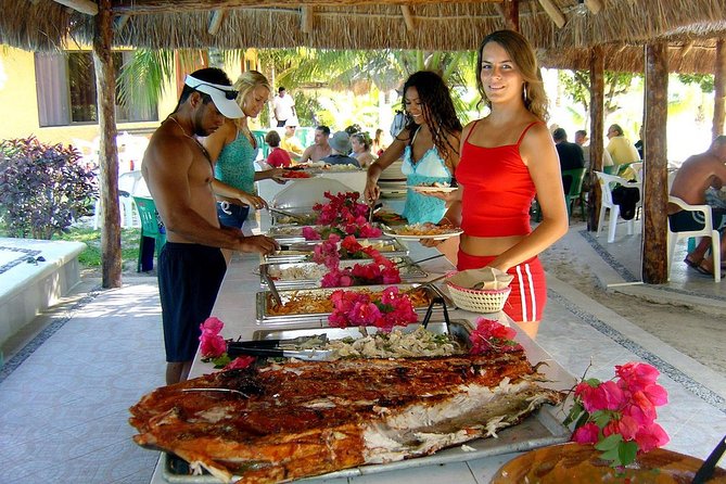Catamaran Sailing to Isla Mujeres with Snorkeling, Lunch & Open Bar included - Lunch and drinks at the beach club