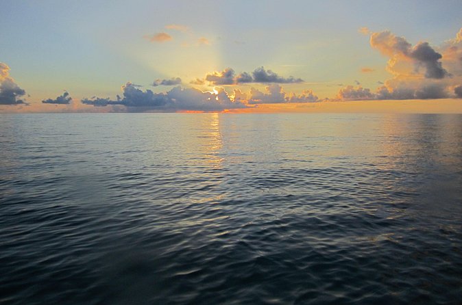 Catamaran Sunset Sail - Rum Swizzles, music, and island stories