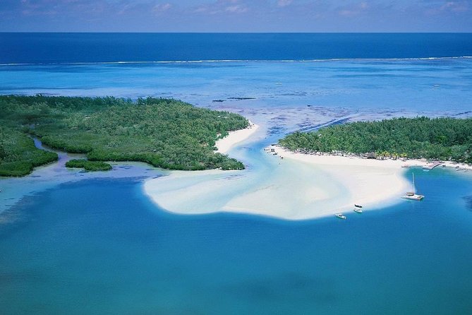 Catamaran to Ile aux Cerf with Parasailing, Tube Riding & Lunch - Lunch, music, and the long middle of the day
