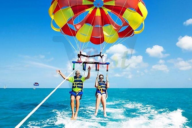 Catamaran to Ile aux Cerf with Parasailing, Tube Riding & Lunch - Parasailing over the East Coast