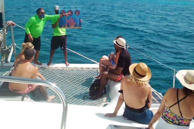 Catamaran to Isla Mujeres, Open bar, buffet, Beach Club Included - Food, beach time, and what the package really includes