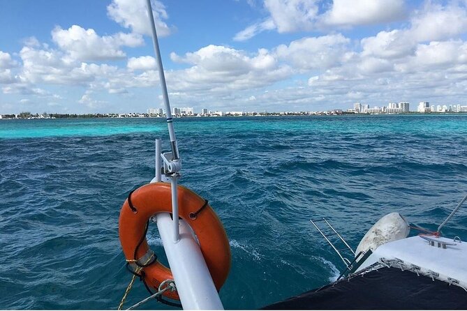 Catamaran to Isla Mujeres, Open bar, buffet, Beach Club Included - Is $62, plus the fee, a fair price?
