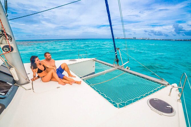 Catamaran to Isla Mujeres Snorkeling Tour with Open Bar and Lunch - The beach club and buffet lunch