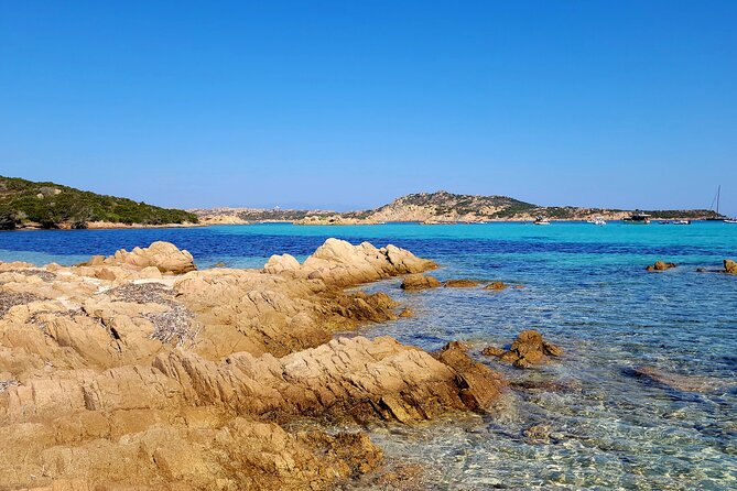 Catamaran Tour from La Caletta near Olbia – Experience Sardinia’s Coast - Capo Comino and its white sand dunes