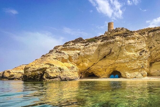 Catamaran tour stops bathing and snorkeling toast with prosecco - Why this Cagliari boat trip works so well