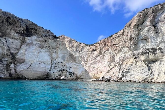Catamaran tour stops bathing and snorkeling toast with prosecco - Sella del Diavolo is the main event