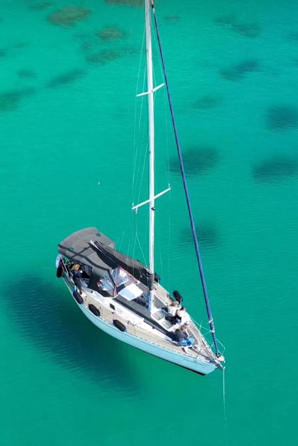 Catamaran tour, swimming, snorkeling, and a Prosecco toast - Cala Mosca and Cala Fighera