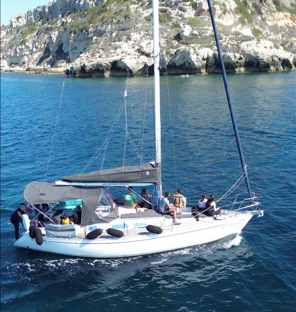 Catamaran tour, swimming, snorkeling, and a Prosecco toast - Who will enjoy this Cagliari boat tour
