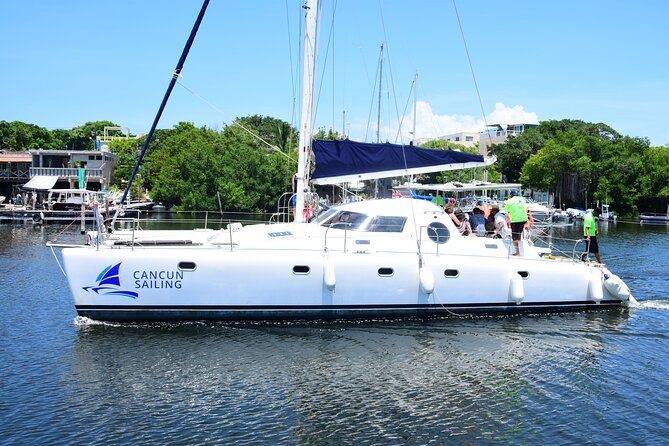 Catamaran Tour to Isla Mujeres, Open bar, Lunch, Snorkeling, Beach Club Included - Practical Details That Matter