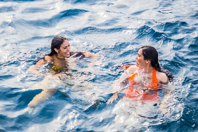 Catamaran tour with swimming stop in Malaga - Onboard comfort, bathroom, and drinks