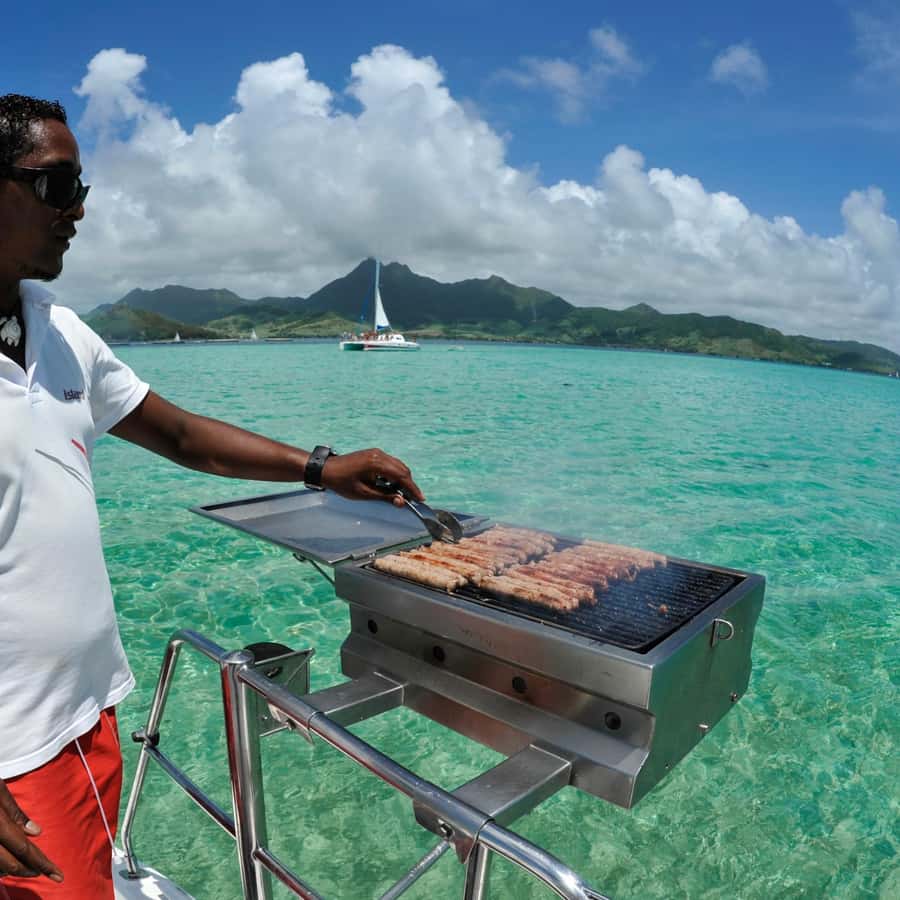 Catamaran trip to Ile Aux Cerfs With Two Way Transportation - Boarding the catamaran and setting the mood
