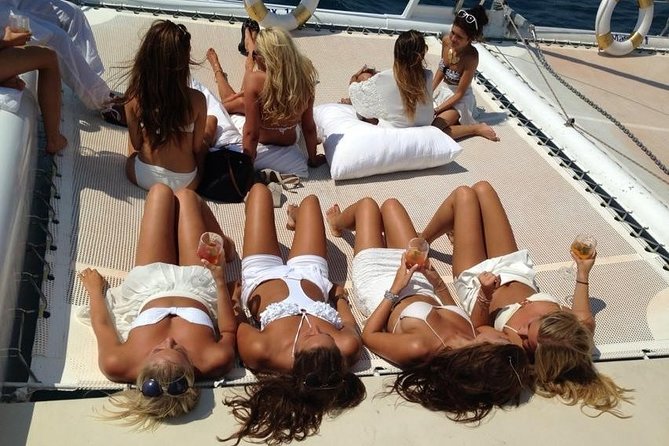 Catamaran trip with other groups along the Costa Brava. Saturday. - Following the Costa Brava Shoreline