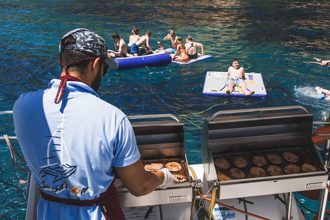 Catamaran trip with other groups along the Costa Brava. Saturday. - Drinks, Music, and the Shared Party Mood