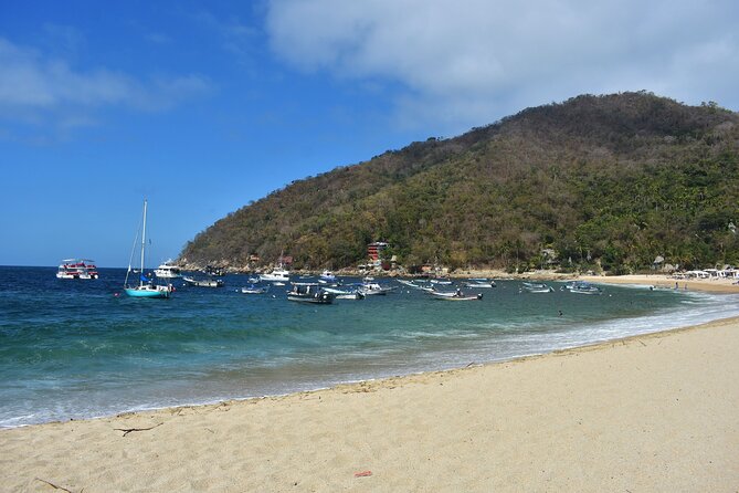 Catamaran Yelapa Beach Tour with Snorkeling, Food and Open Bar - Lunch, beach time, and extra costs