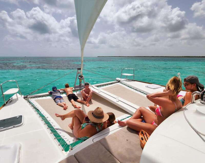 Cozumel: Catamaran Tour To Isla de la Pasión - Food, fruit, and drinks on the open water