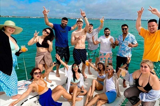 Deluxe Catamaran to Isla Mujeres, with Drinks, Snorkel & Buffet - The real value at $34.90, plus the required fee