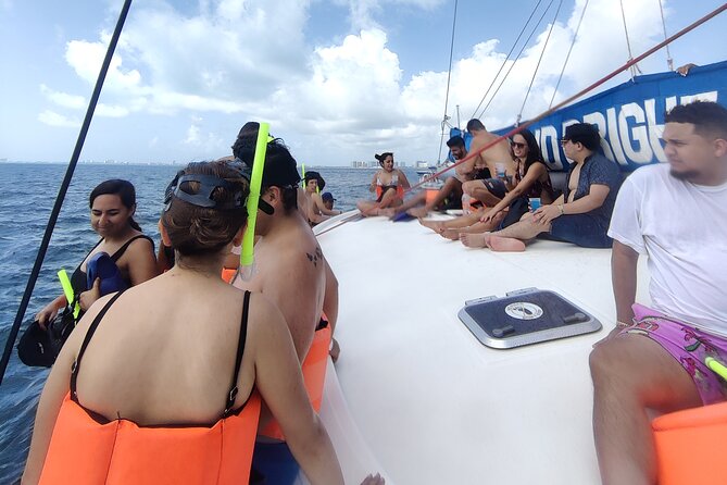 Deluxe Catamaran to Isla Mujeres, with Drinks, Snorkel & Buffet - Snorkeling in Cancun’s clear water