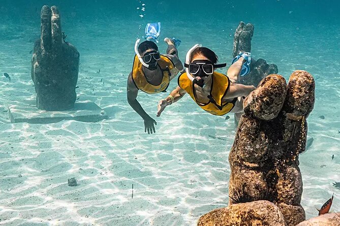 Deluxe Catamaran to Isla Mujeres with Open Bar from Cancun - The snorkeling stop: clear water, limited control
