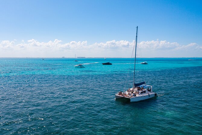 Deluxe Catamaran to Isla Mujeres with Open Bar from Cancun - Sailing across the water to Isla Mujeres