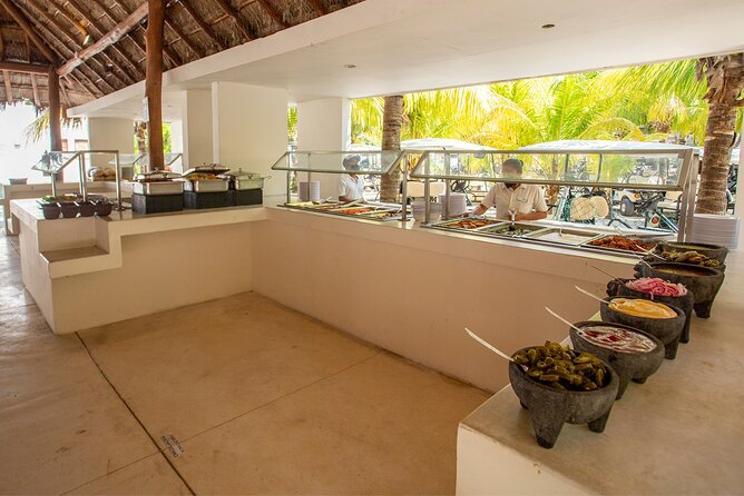 Deluxe Catamaran tour to Isla Mujeres with Open Bar and Lunch - Two and a half hours at Albatros Beach Club