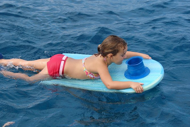 Deluxe Snorkel & Dolphin Watch Aboard a Luxury Catamaran from Kailua-Kona - Who will get the most from this cruise