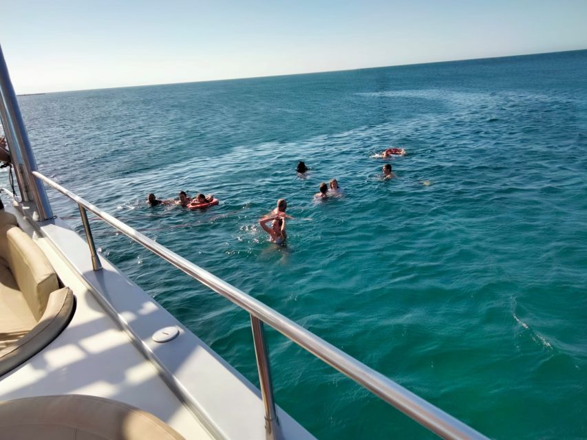 Denia: Cova Tallada Catamaran Tour and Swimming Stop - Sailing from Denia toward Cova Tallada