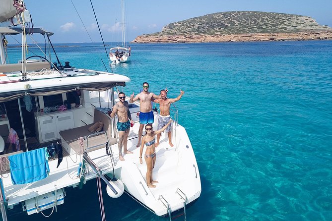 Discover Cala Bassa and Cala Comte on board a catamaran - Cala Comte and its blue water