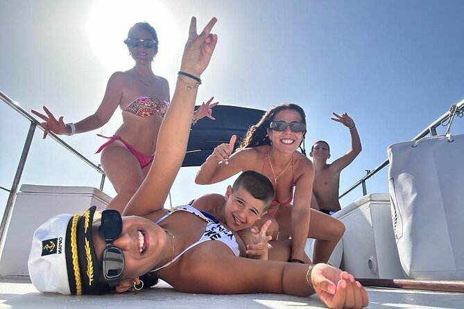 Discovering Cefalù's Coastline Activity on a Mini Catamaran - Swimming in three different parts of the coastline