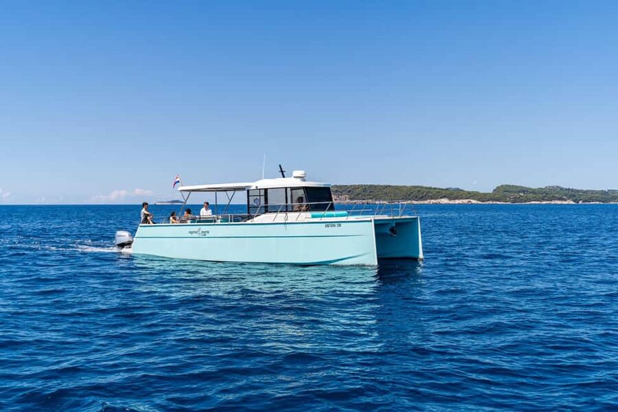 Dubrovnik: Sunset Catamaran Cruise with Sparkling Wine - Leaving Dubrovnik’s Old Town harbor