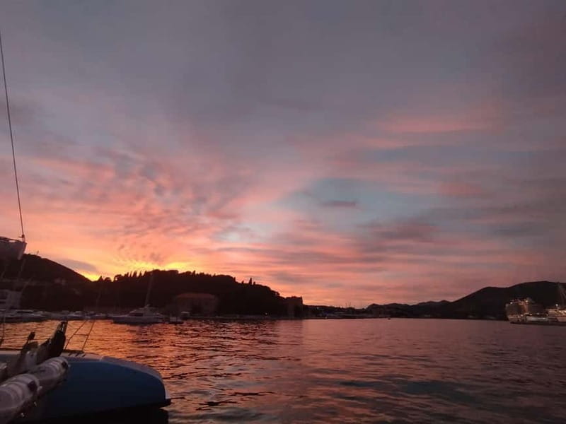 Dubrovnik: Sunset Catamaran Cruise with Sparkling Wine - Sparkling wine as the sun drops