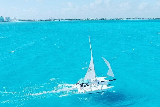 Exciting Catamaran Tour to Isla Mujeres, from Cancún! - Beach-club lunch and the practical details