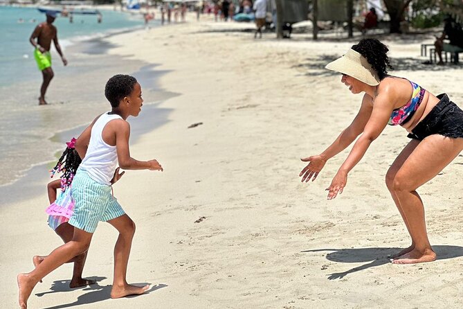 Family Catamaran Cruise from Jamwest Beach Negril Hotels - Boarding can mean a wet walk